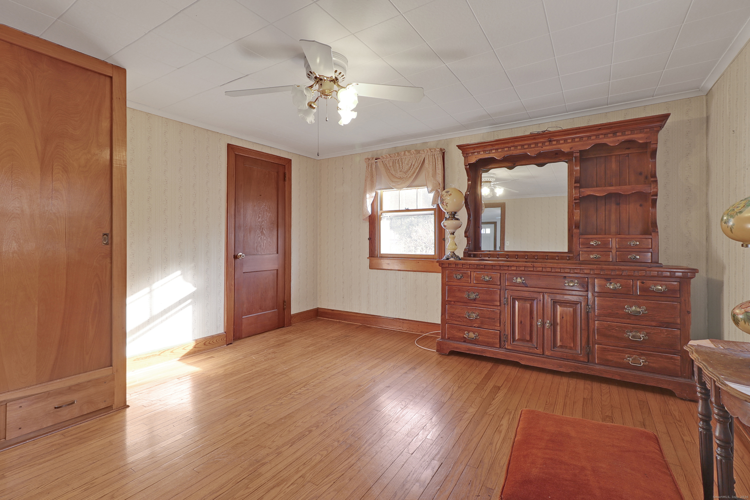 60 Frost Street Southington, CT 06479 - Photo 17 of 35 wooden floor in an empty room with a window