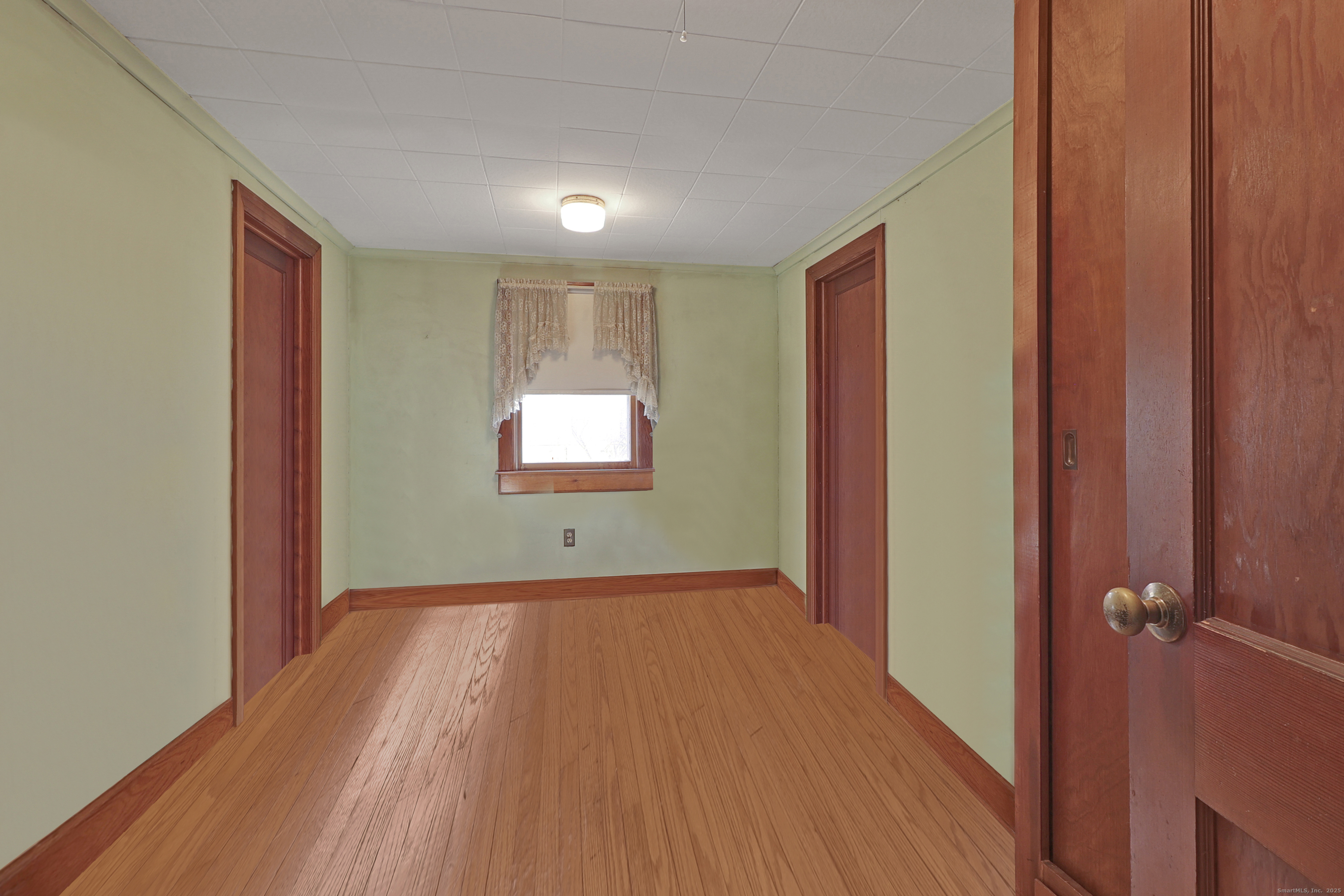60 Frost Street Southington, CT 06479 - Photo 19 of 35 a view of a room with wooden floor and entryway