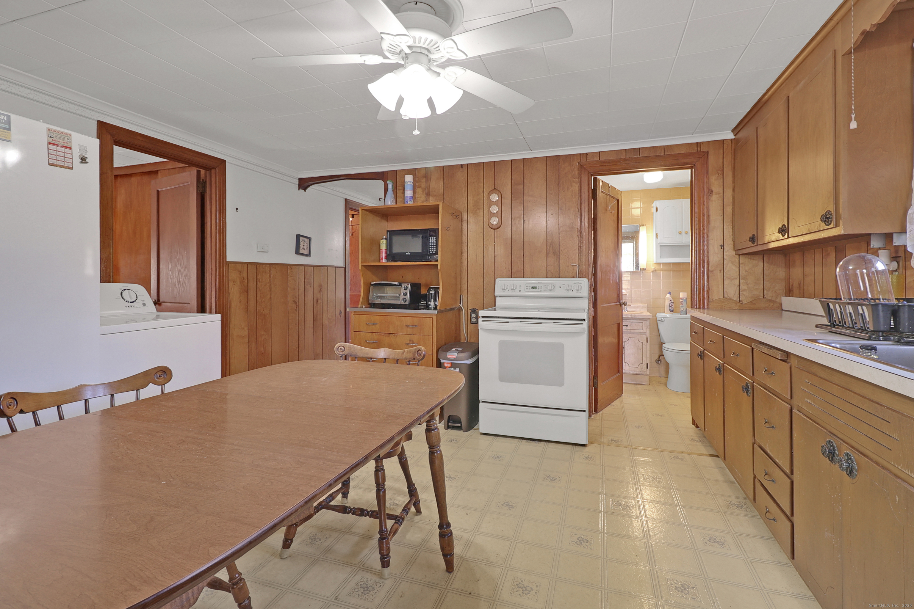 60 Frost Street Southington, CT 06479 - Photo 30 of 35 a kitchen with cabinets a sink and appliances