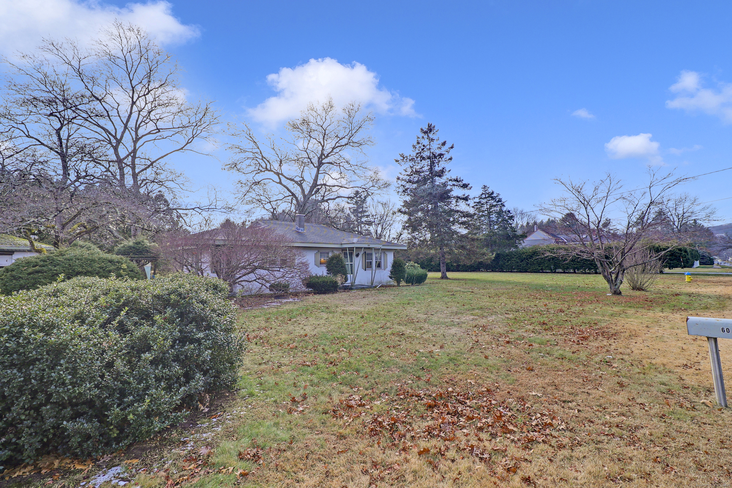 60 Frost Street Southington, CT 06479 - Photo 5 of 35 a backyard of a house with lots of green space