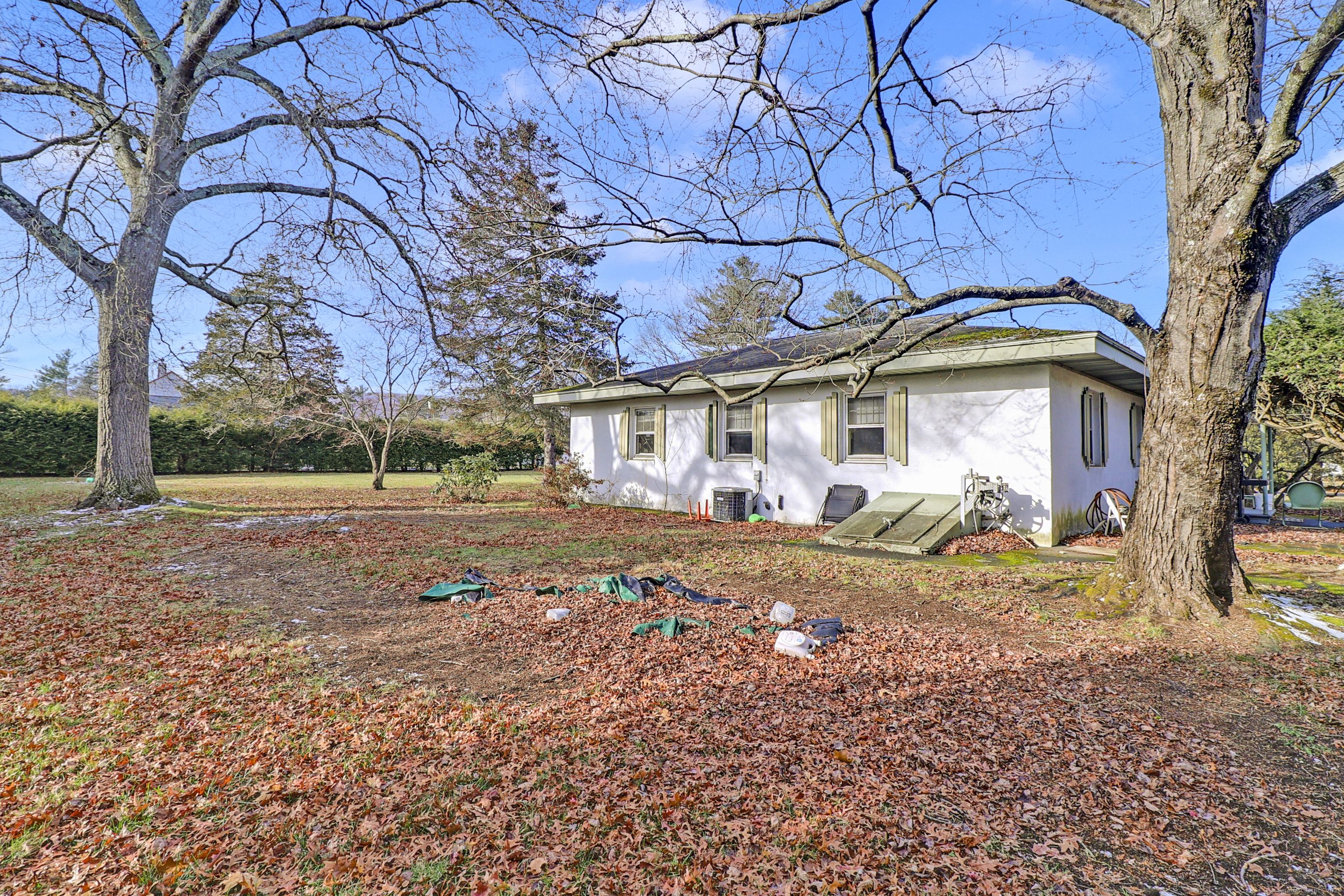 60 Frost Street Southington, CT 06479 - Photo 8 of 35 a front view of a house with a yard
