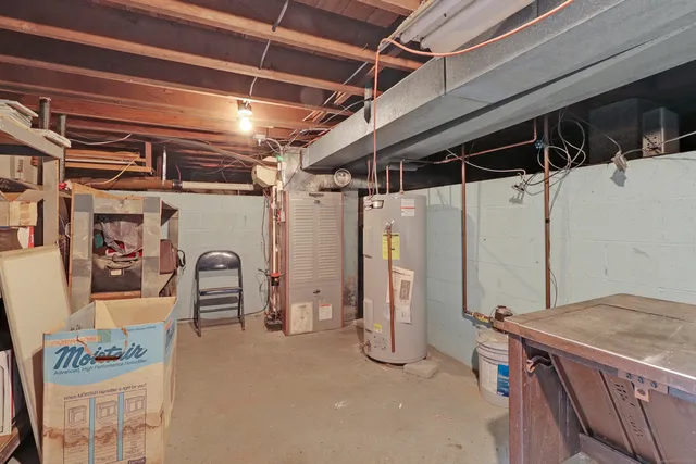 a view of a room with wooden walls