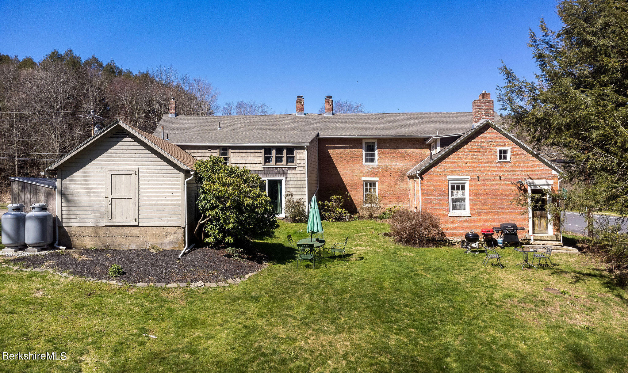 3 Lake Buel Road Great Barrington, MA 01230 - Photo 48 of 55 a view of a house with a yard