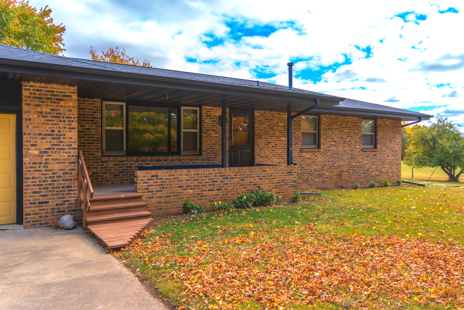 2804 Hendrix Drive Bloomington, IL 61704 - Photo 13 of 71 a front view of a house with a yard