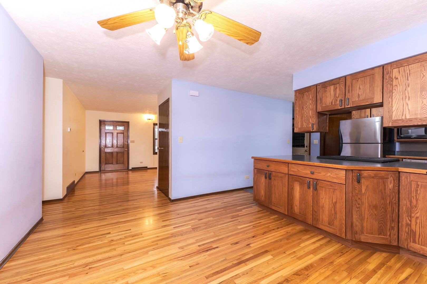 2804 Hendrix Drive Bloomington, IL 61704 - Photo 18 of 71 a kitchen with stainless steel appliances granite countertop a sink and cabinets