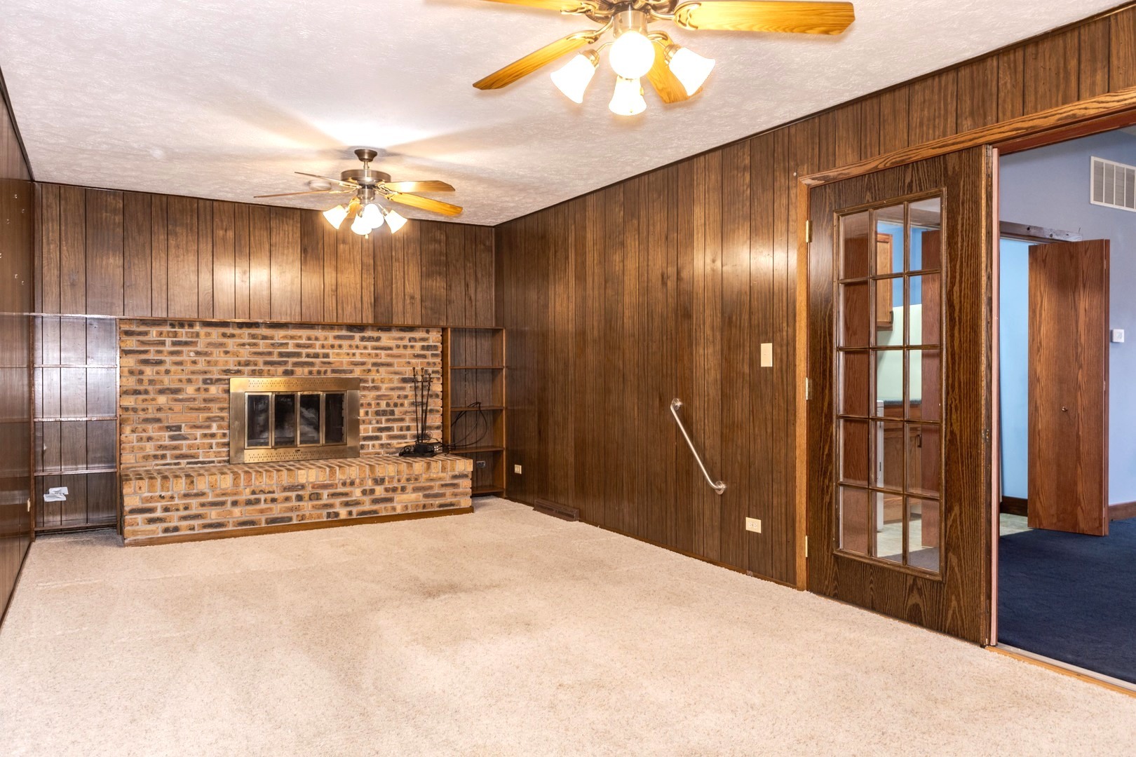 2804 Hendrix Drive Bloomington, IL 61704 - Photo 24 of 71 a bedroom with a bed and a chandelier