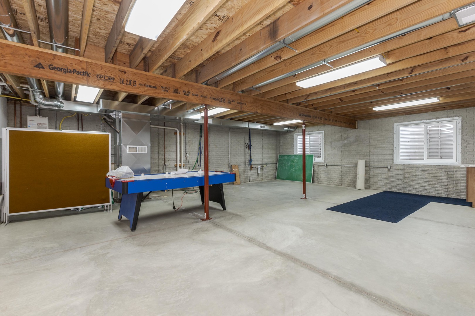 2804 Hendrix Drive Bloomington, IL 61704 - Photo 49 of 71 a view of a room with chairs and a projector
