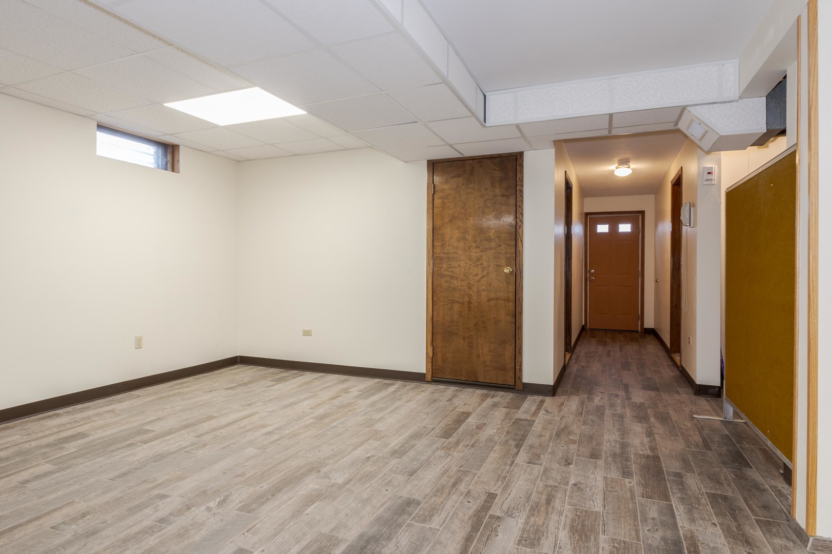 2804 Hendrix Drive Bloomington, IL 61704 - Photo 52 of 71 a view of a room with wooden floor