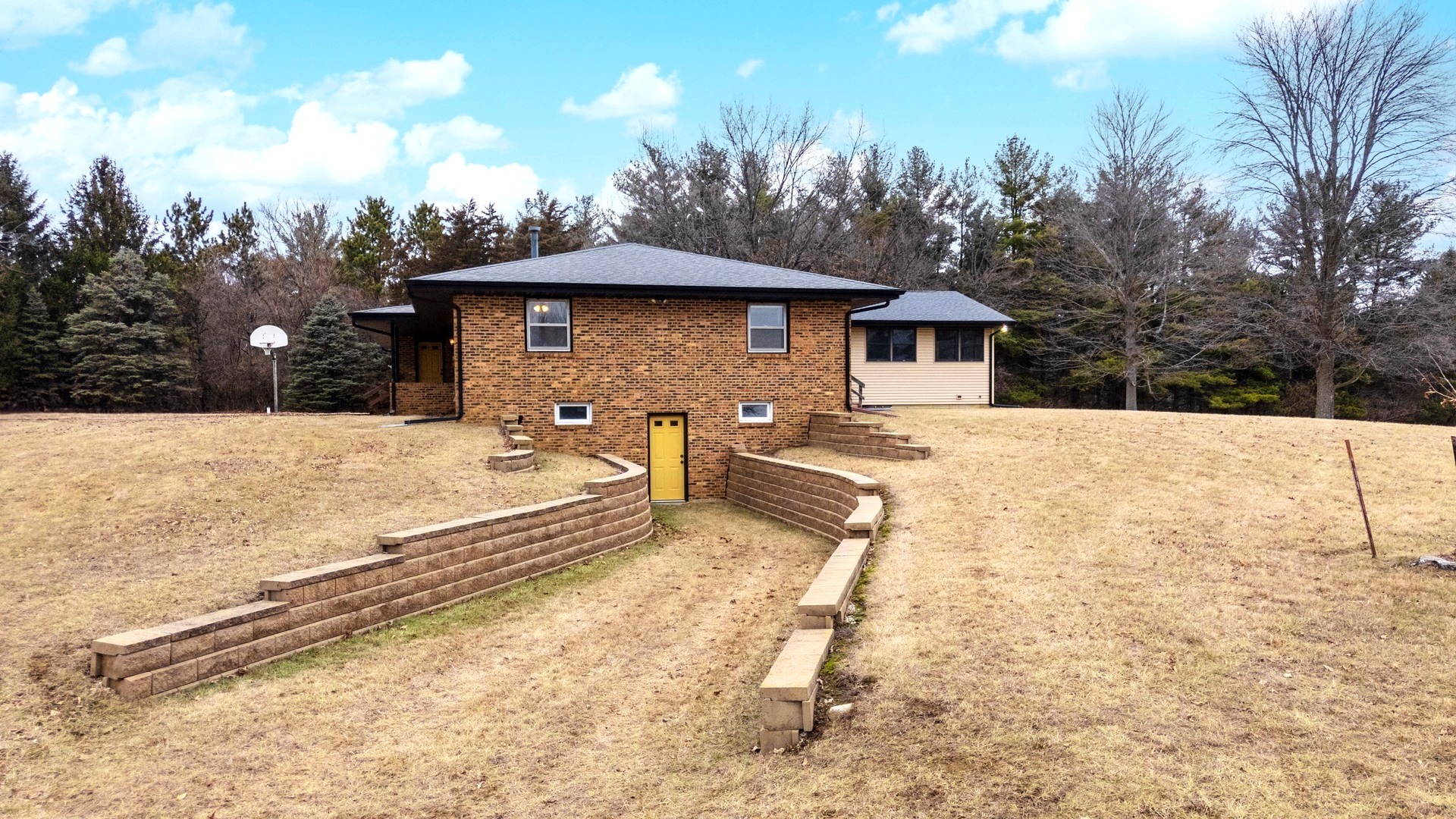 2804 Hendrix Drive Bloomington, IL 61704 - Photo 54 of 71 a view of a house with a yard covered in snow