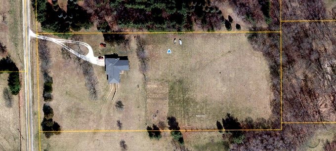 2804 Hendrix Drive Bloomington, IL 61704 - Photo 59 of 71 a view of a bathroom with a shower and a sink