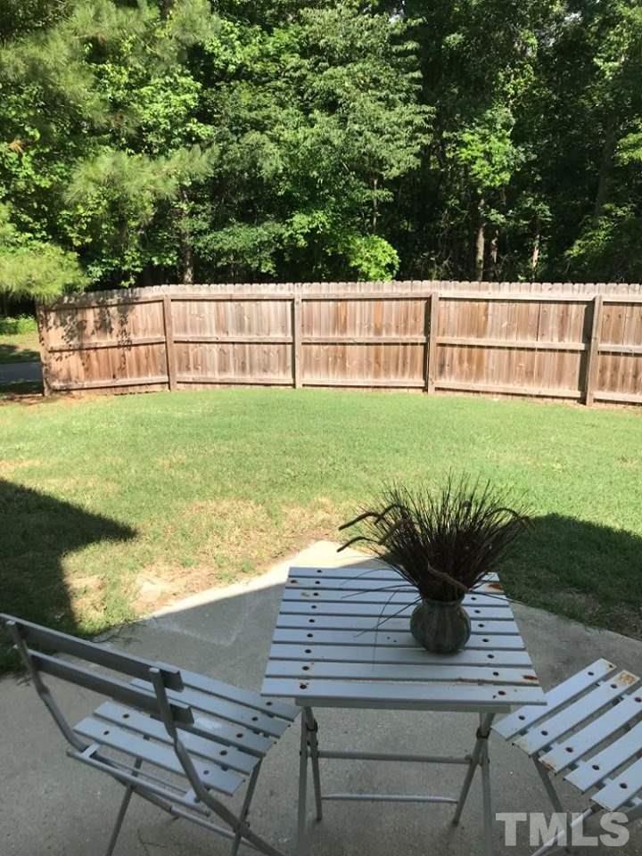 2231 Walnut Ridge Court Raleigh, NC 27610 - Photo 12 of 15 Enjoy your private fenced in patio with the Greenway Trail just beyond the fence.