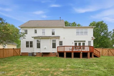 an aerial view of a house with a garden