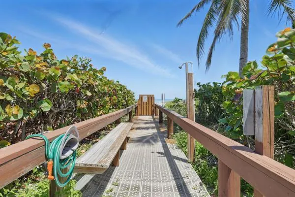 a view of balcony with furniture