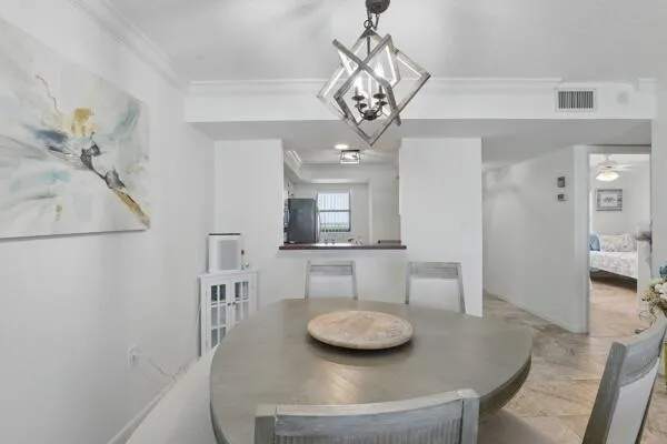 a view of a dining room with furniture