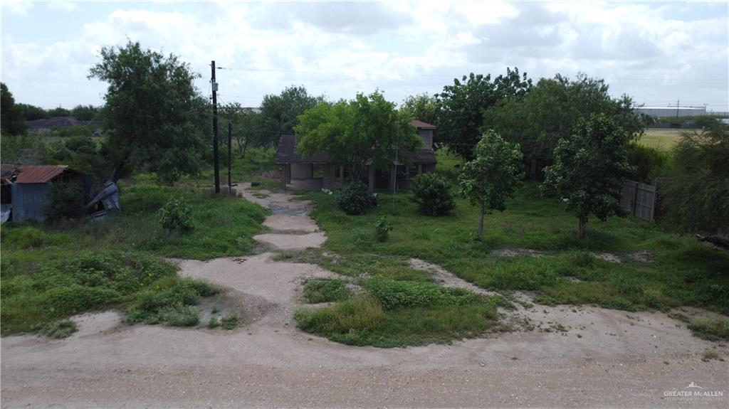 1524 West Hi Line Road Pharr, TX 78577 - Photo 17 of 34 a big yard with lots of green space and plants