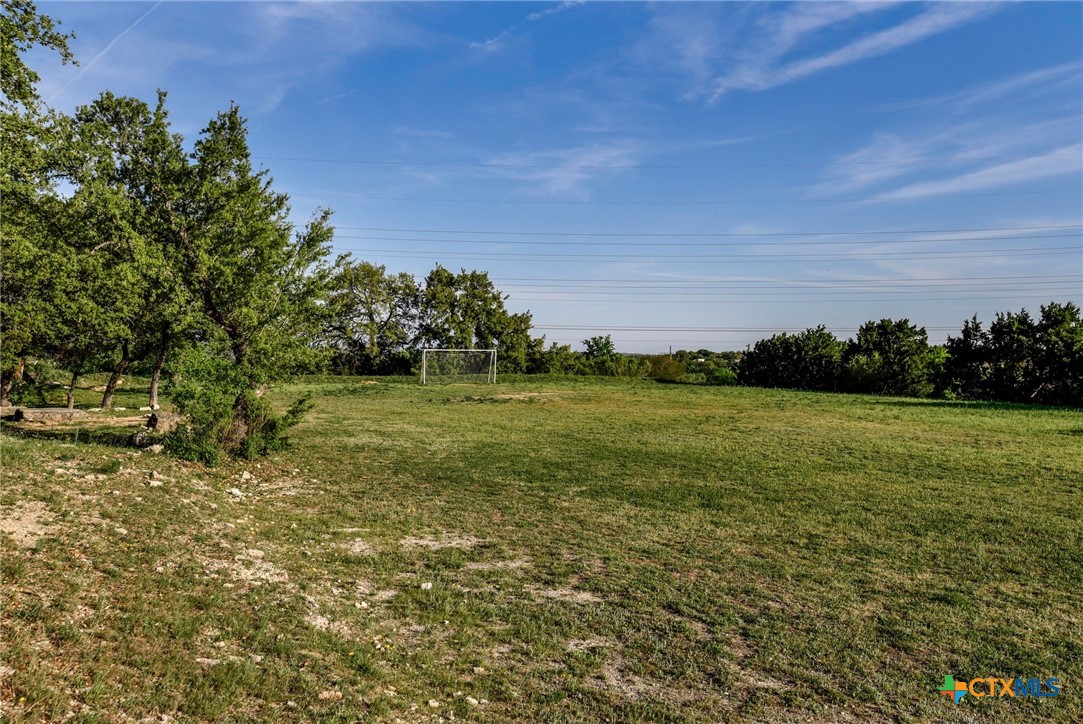 14422 Tuscola Circle Austin, TX 78734 - Photo 14 of 22 a view of a field with an trees