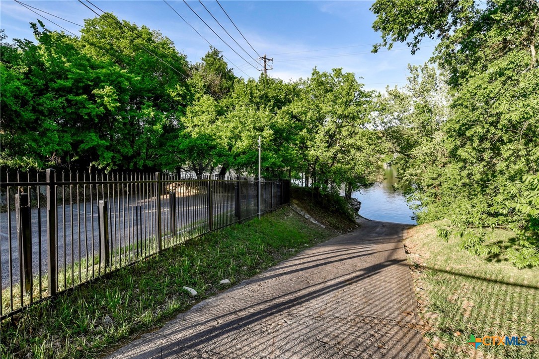 14422 Tuscola Circle Austin, TX 78734 - Photo 17 of 22 a view of a backyard with pathway