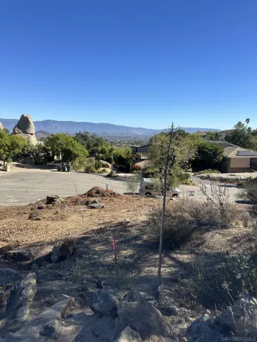 a view of a beach with a ocean view