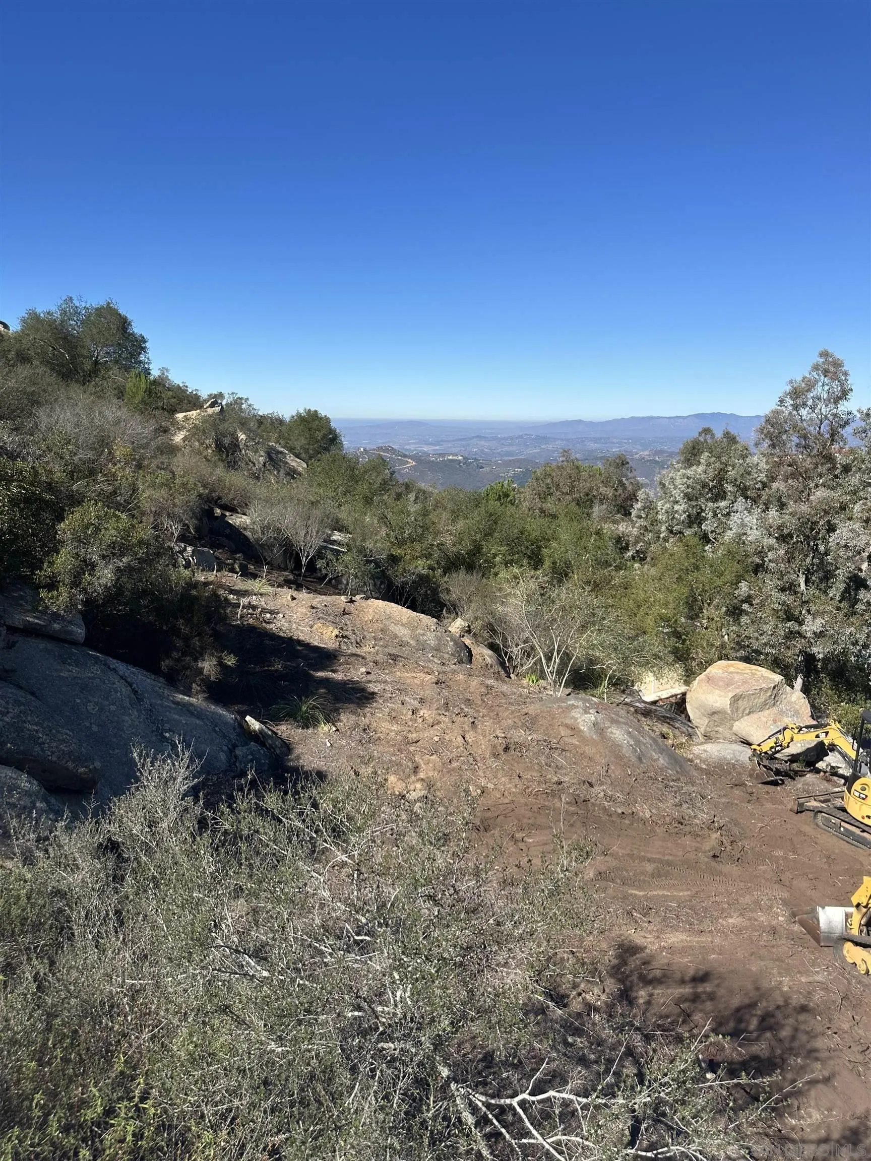 0 Sage Hill Way, Unit 146 Escondido, CA 92025 - Photo 3 of 7 a view of a road with a mountain