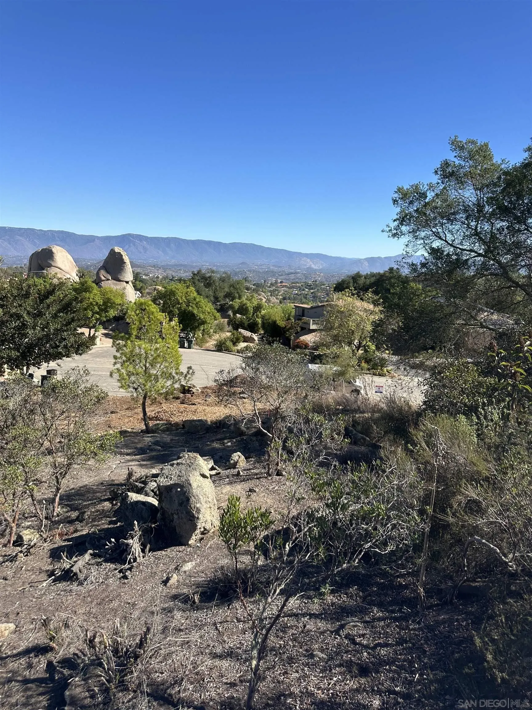 0 Sage Hill Way, Unit 146 Escondido, CA 92025 - Photo 4 of 7 a view of a lake with a mountain