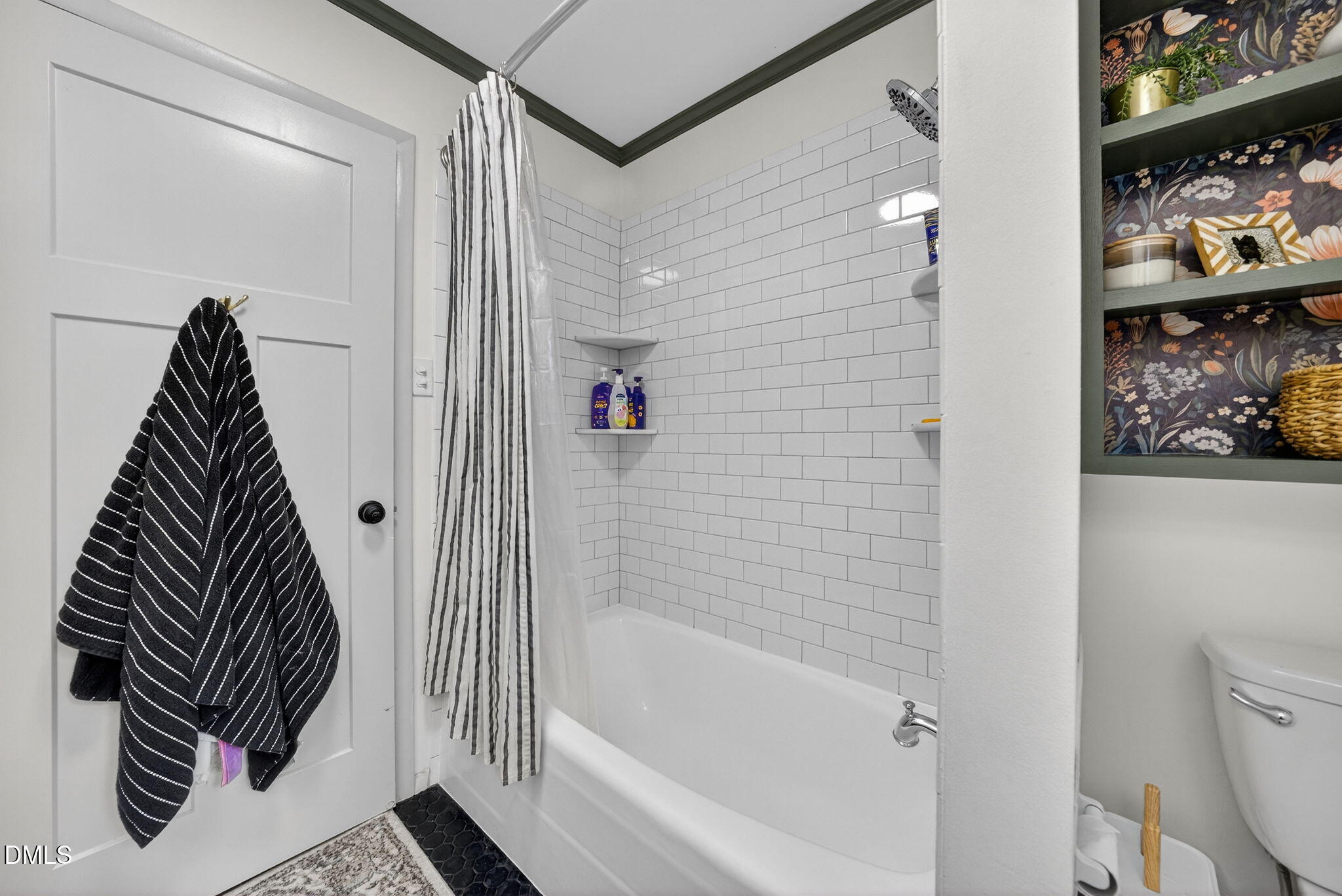 2808 Carpenter Pond Road Raleigh, NC 27613 - Photo 21 of 49 a bathroom with a bathtub and a shower