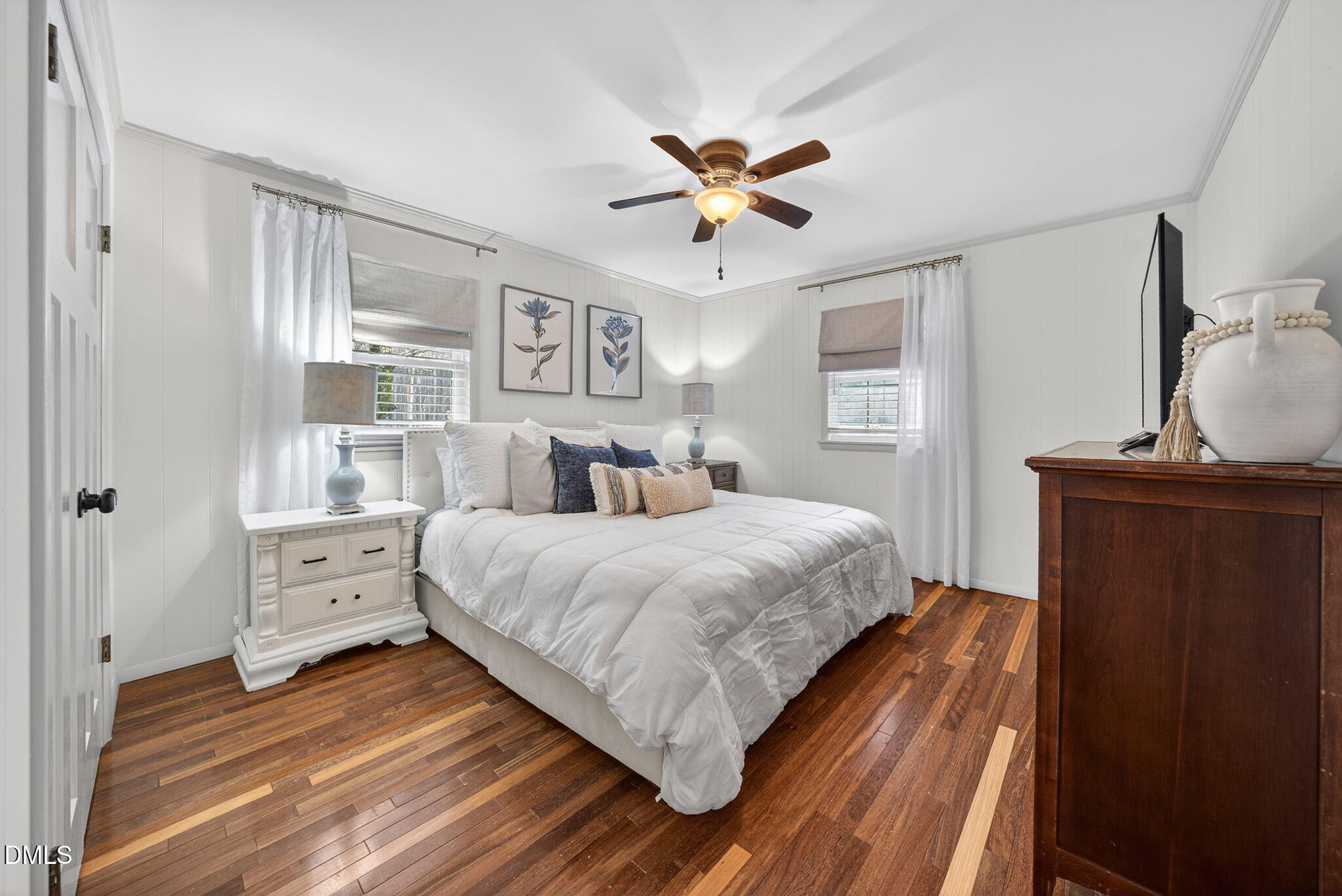 2808 Carpenter Pond Road Raleigh, NC 27613 - Photo 23 of 49 a bedroom with a large bed and a window
