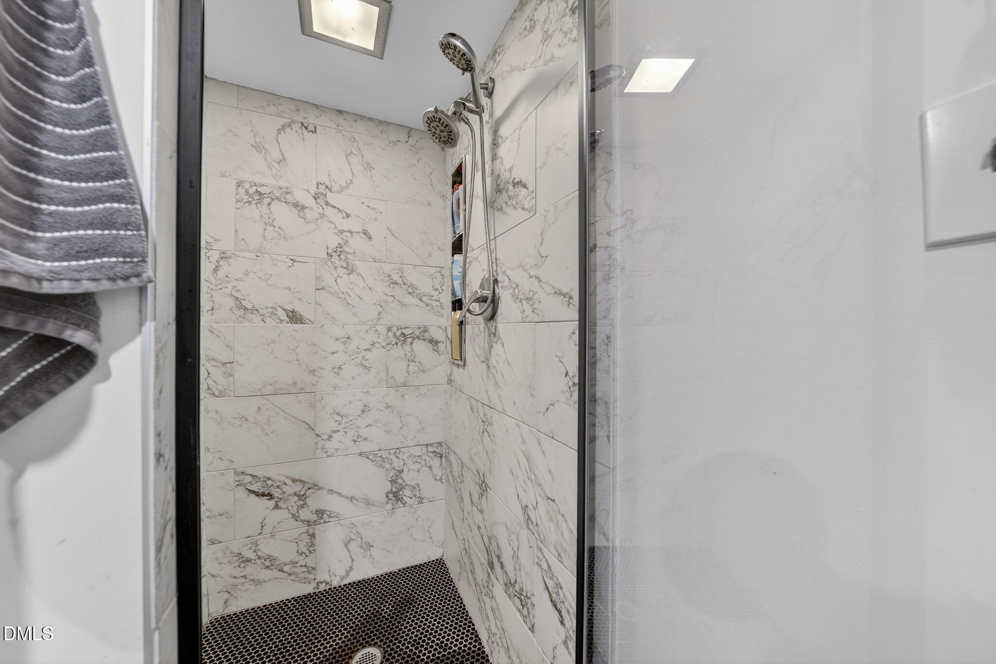 2808 Carpenter Pond Road Raleigh, NC 27613 - Photo 31 of 49 a bathroom with a shower