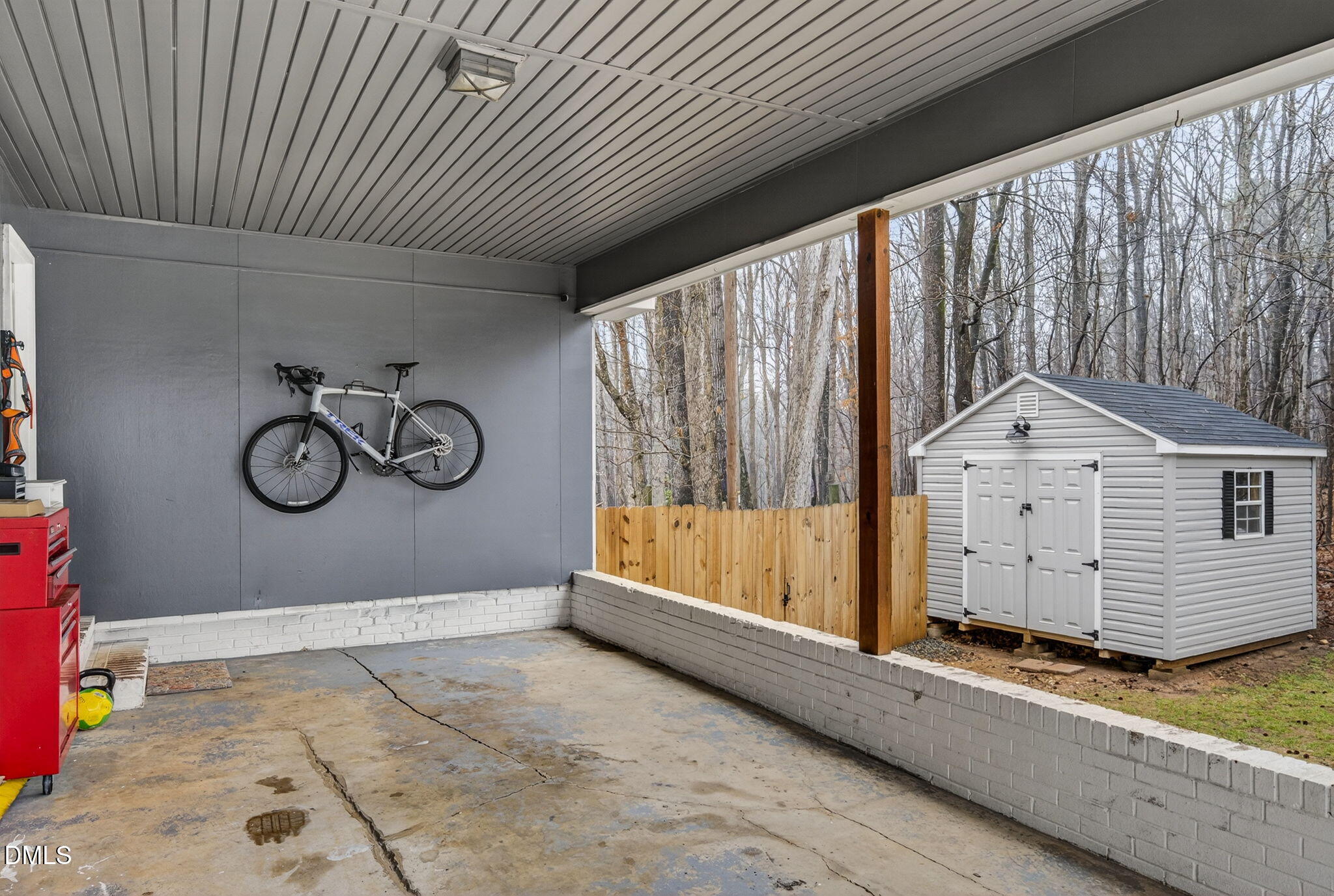 2808 Carpenter Pond Road Raleigh, NC 27613 - Photo 41 of 49 a view of a room with rack on the wall