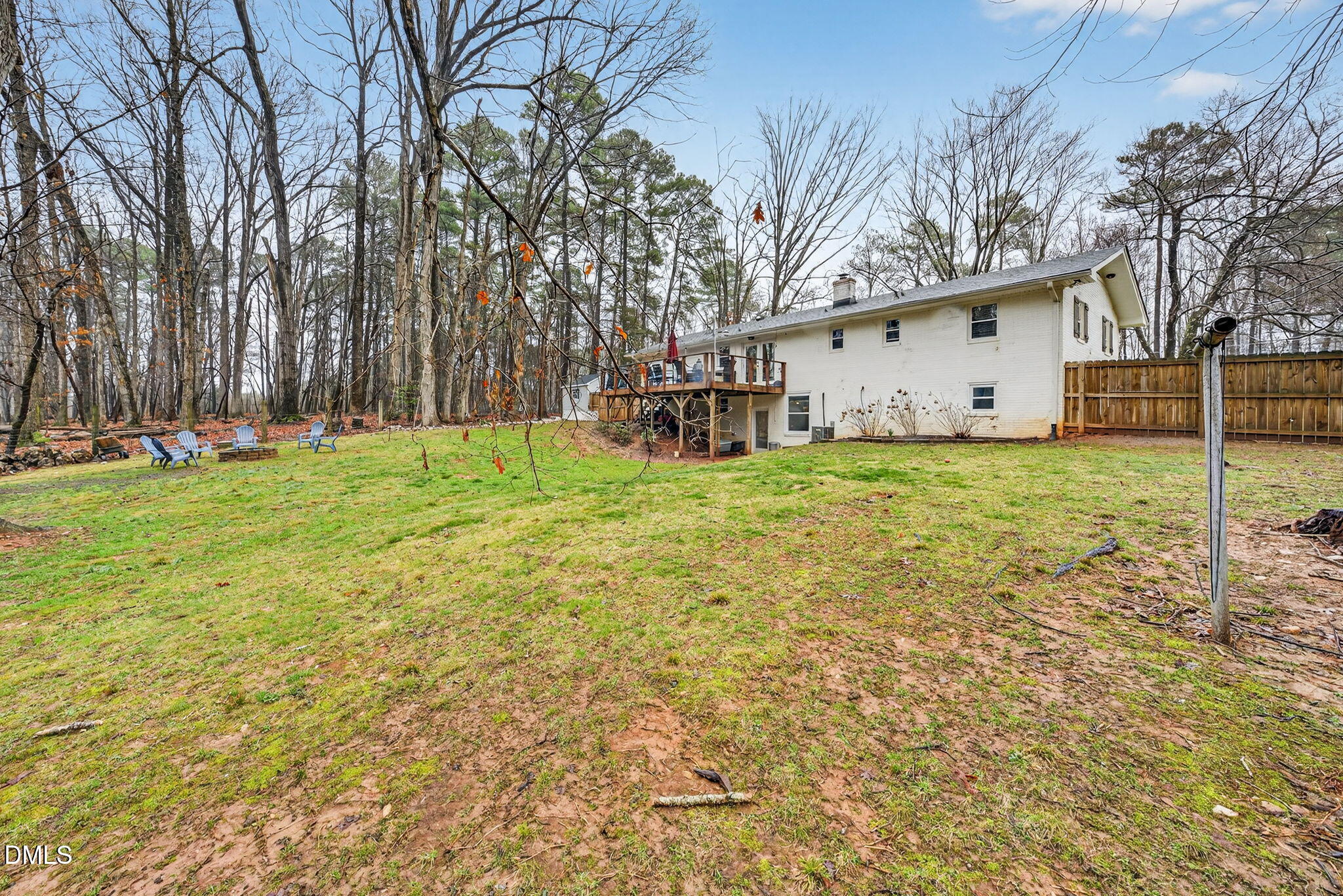 2808 Carpenter Pond Road Raleigh, NC 27613 - Photo 47 of 49 a view of a house with backyard and trees