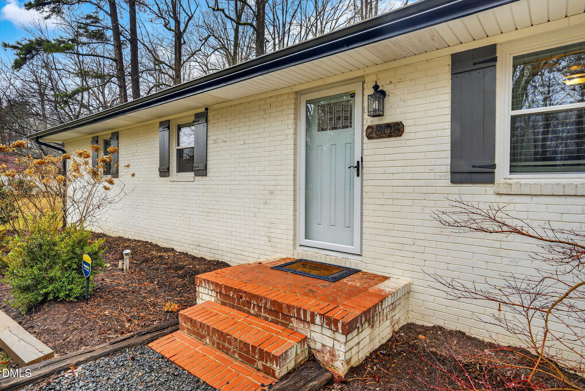 2808 Carpenter Pond Road Raleigh, NC 27613 - Photo 4 of 49 a backyard of a house with seating space