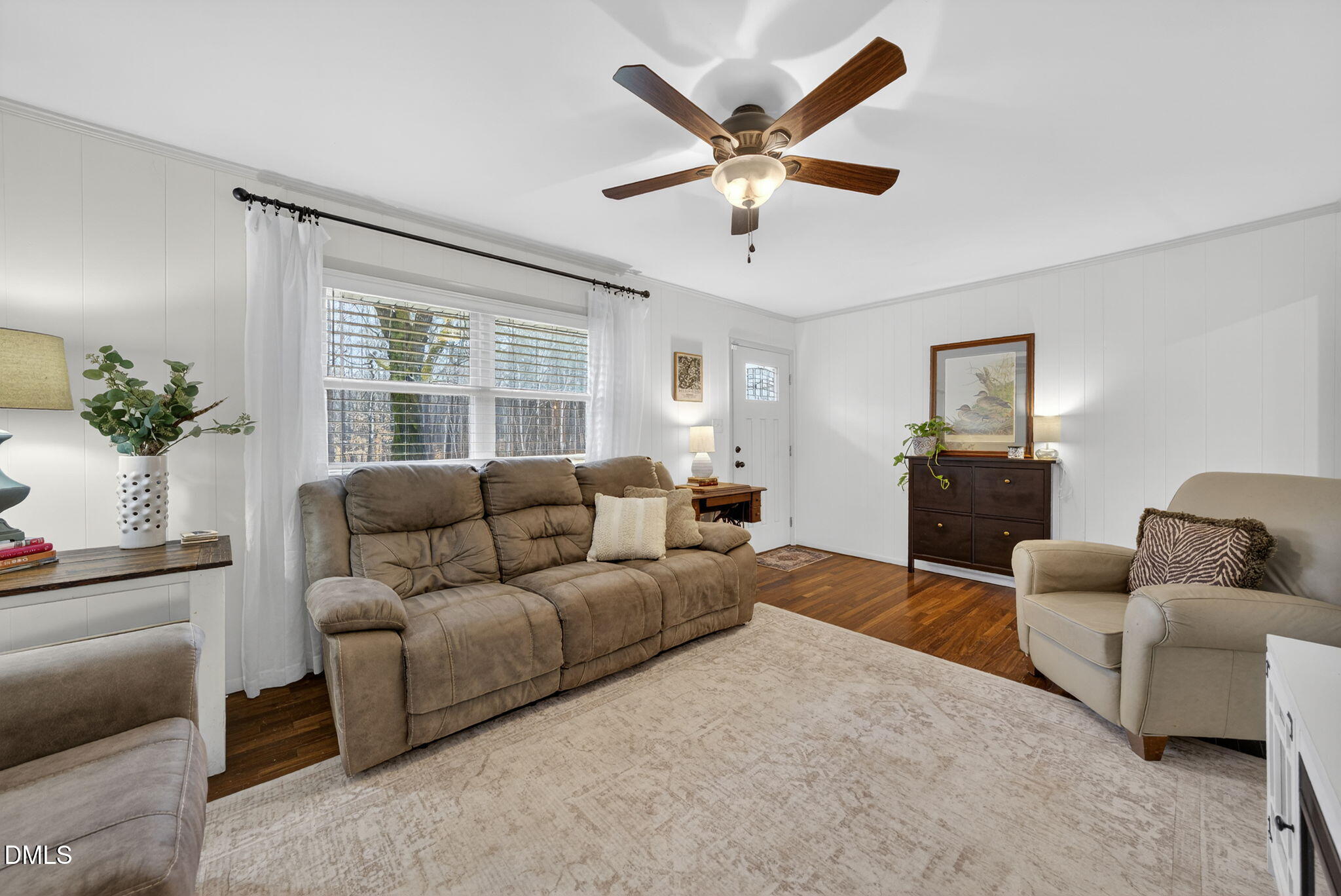 2808 Carpenter Pond Road Raleigh, NC 27613 - Photo 8 of 49 a living room with furniture and a large window