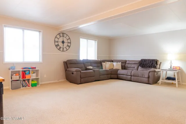 a living room with furniture and a couch