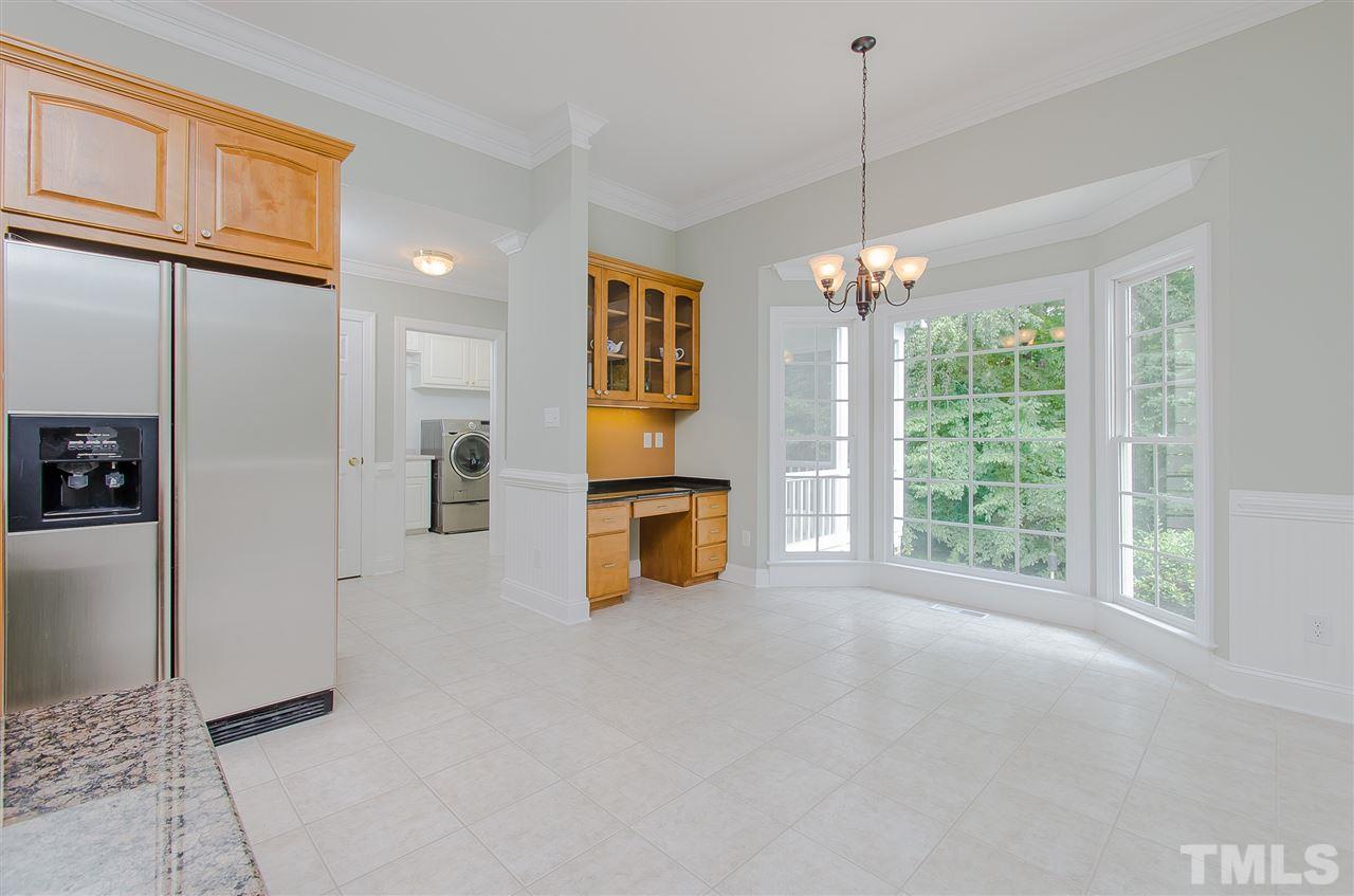 12016 Shooting Club Road Raleigh, NC 27613 - Photo 12 of 25 a view of a room with furniture window and outside view