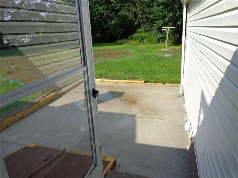 49 Oak Ridge Road Biddeford, ME 04005 - Photo 14 of 14 Patio/Deck. concrete patio off...