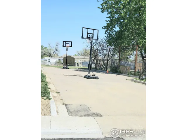 a view of a living room with a sink and a large window