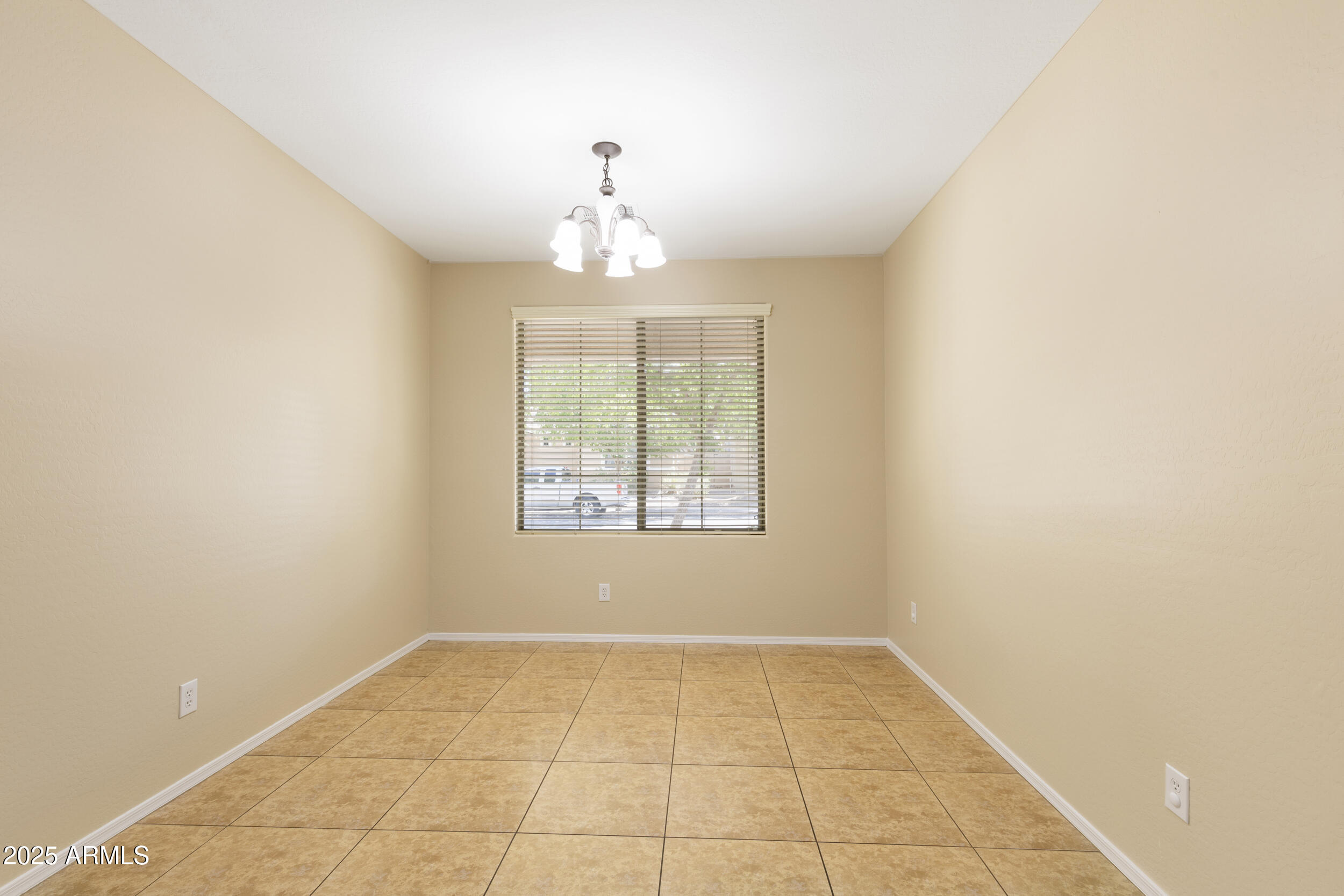 1870 South Colt Drive Gilbert, AZ 85295 - Photo 19 of 42 a view of an empty room with a window