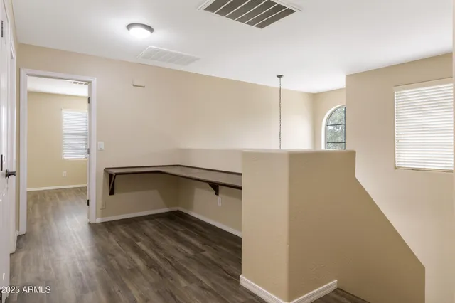 a utility room with closet dryer and washer
