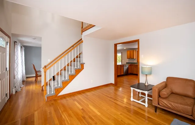 a livingroom with furniture staircase and a living room