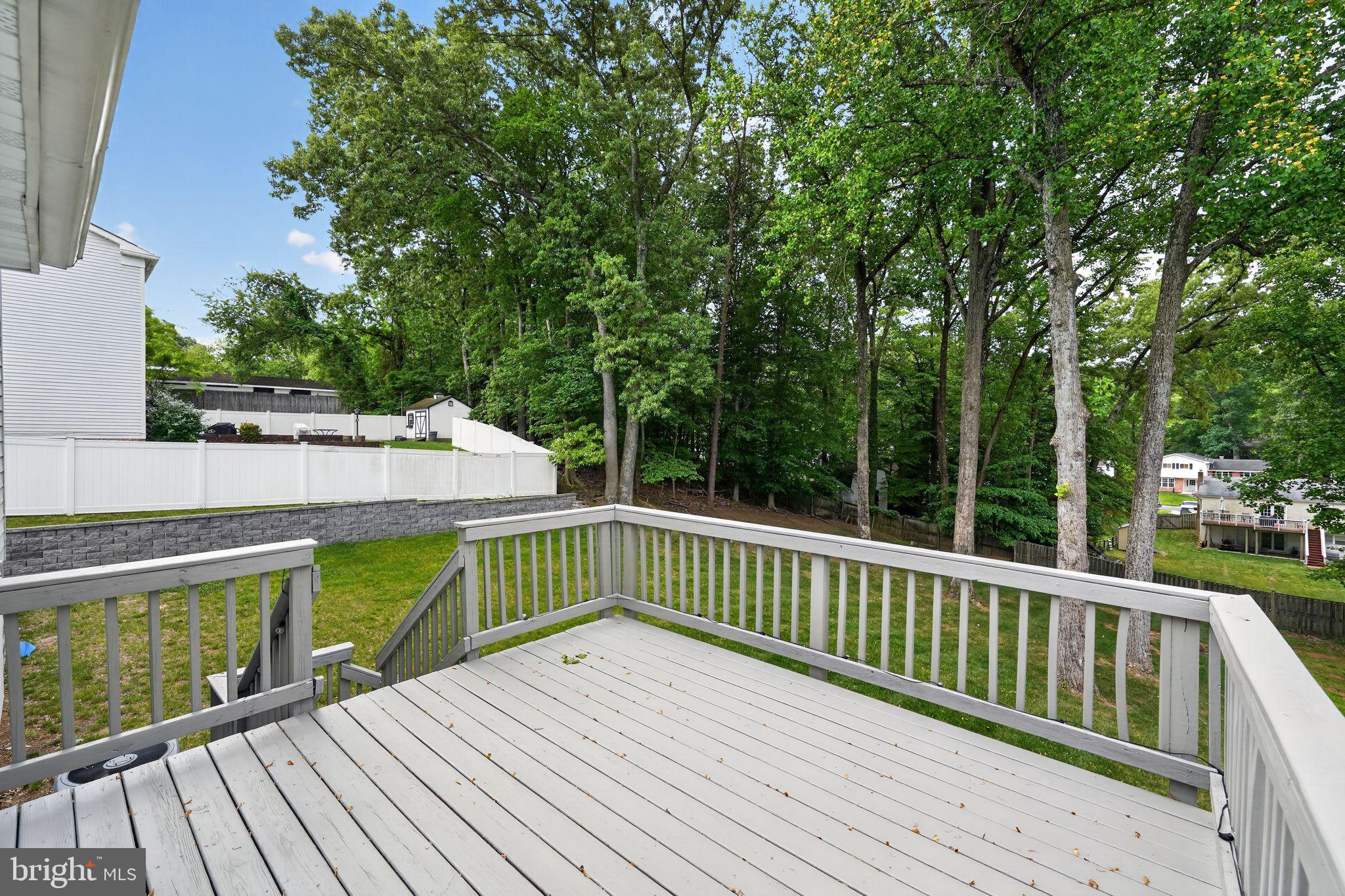 13312 Fort Washington Road Fort Washington, MD 20744 - Photo 11 of 34 a view of balcony with wooden floor and fence