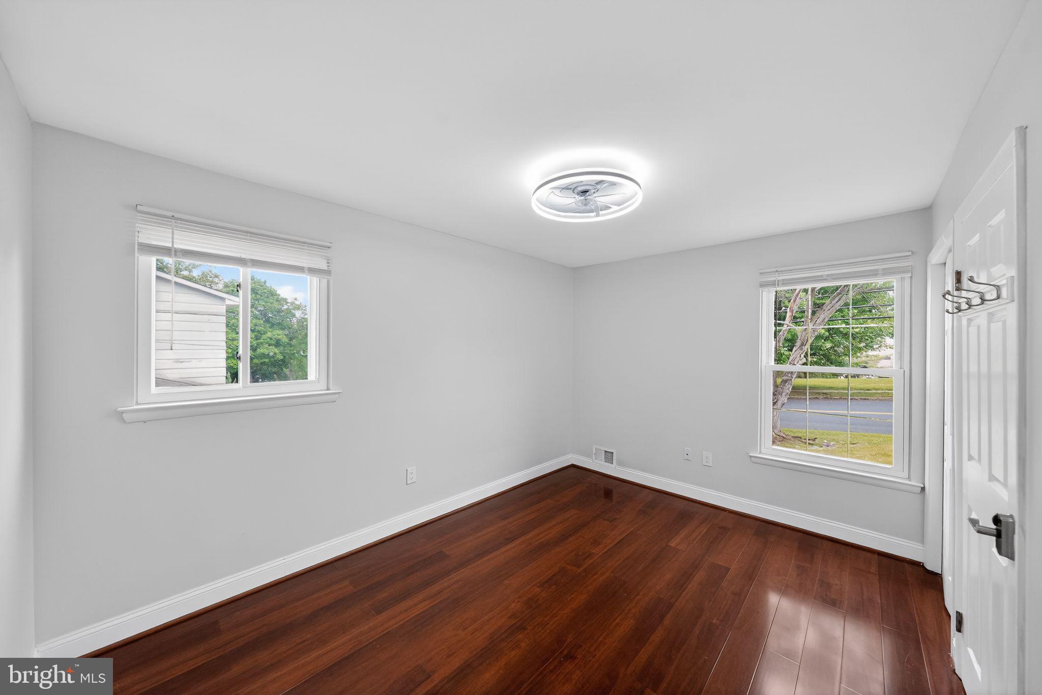 13312 Fort Washington Road Fort Washington, MD 20744 - Photo 17 of 34 a view of a room that has wooden floor and window