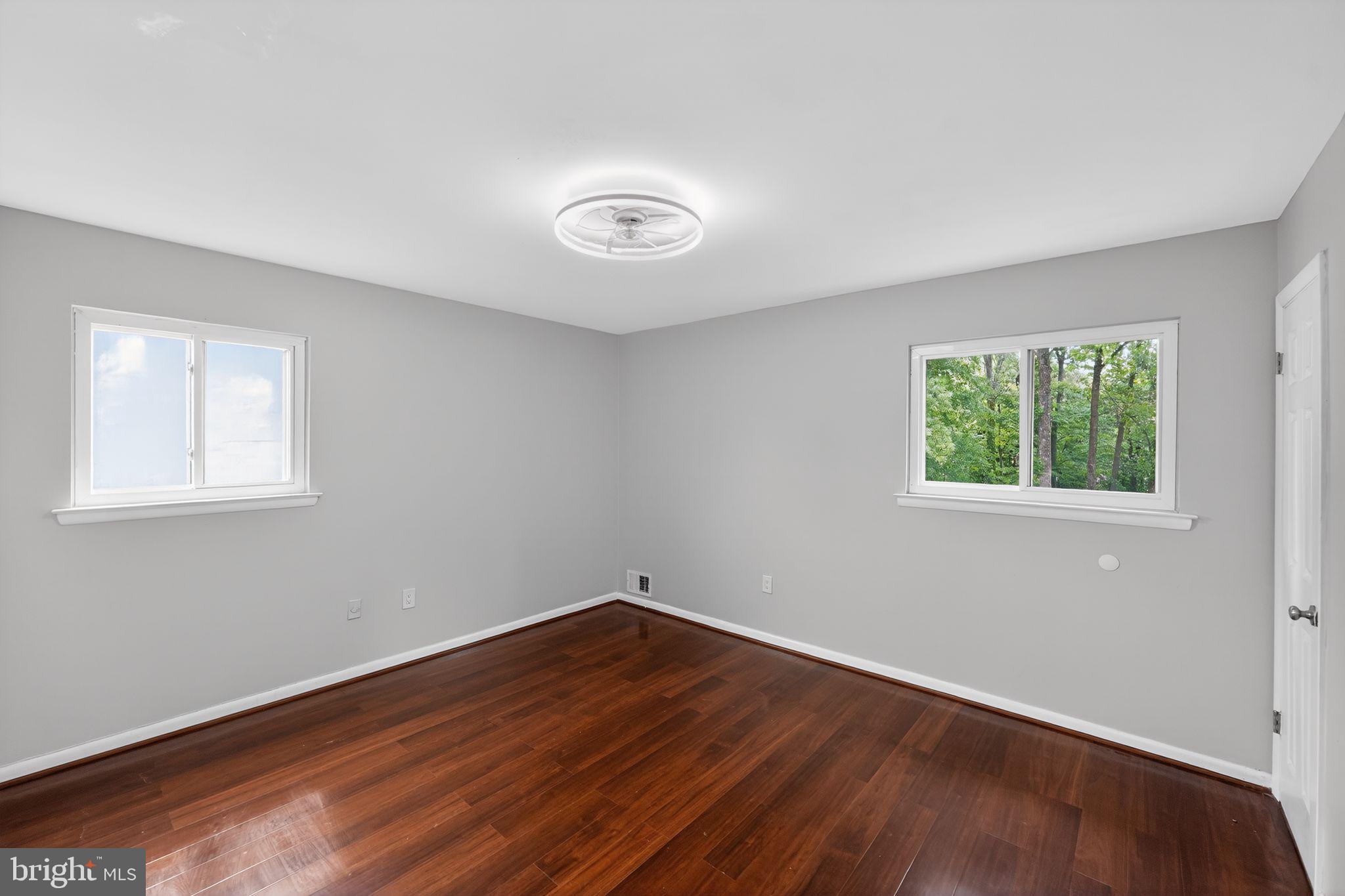 13312 Fort Washington Road Fort Washington, MD 20744 - Photo 19 of 34 a view of a room with wooden floor and window