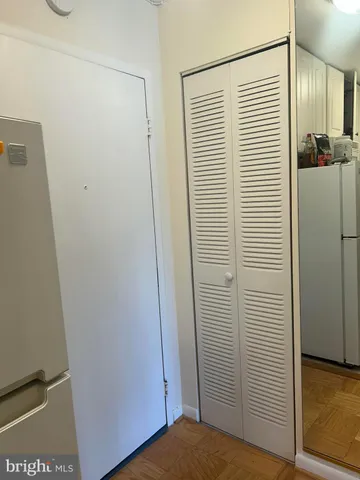 a view of a bedroom with a small space