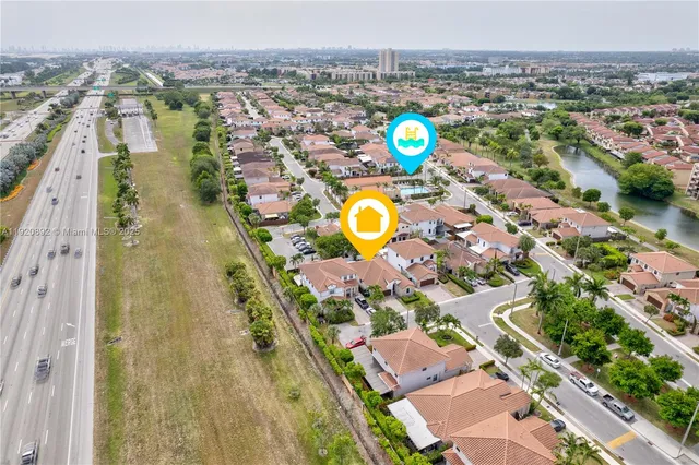 an aerial view of residential house with outdoor space