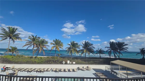 a view of a terrace with sitting area