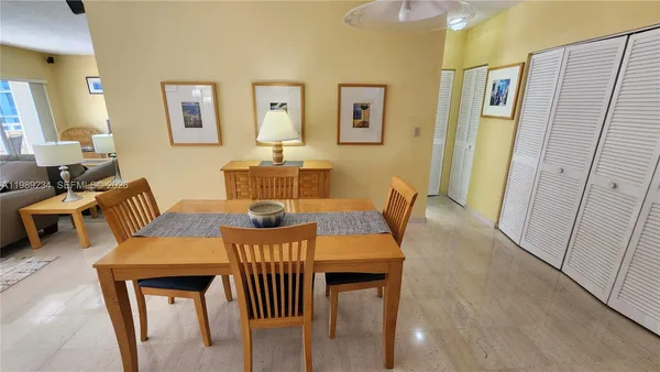 a view of a dining room with furniture