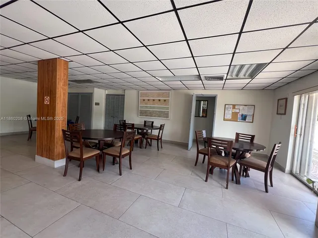 a view of a swimming pool with a lounge chairs