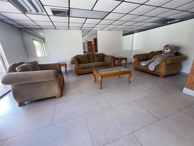 a view of a patio with a fountain