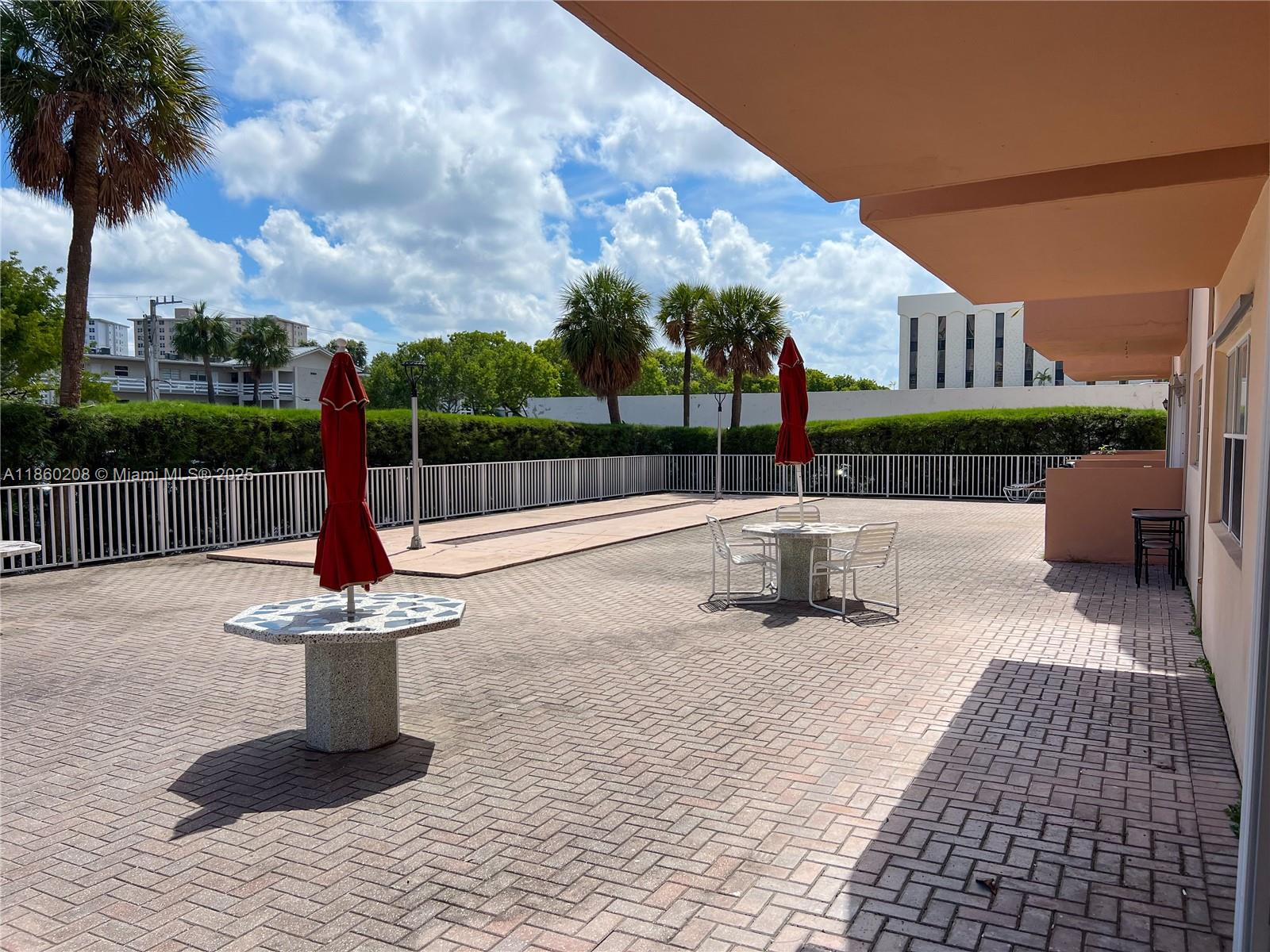 2200 East Hallandale Beach Boulevard, Unit 603 Hallandale Beach, FL 33009 - Photo 16 of 17 a view of a patio with a fountain