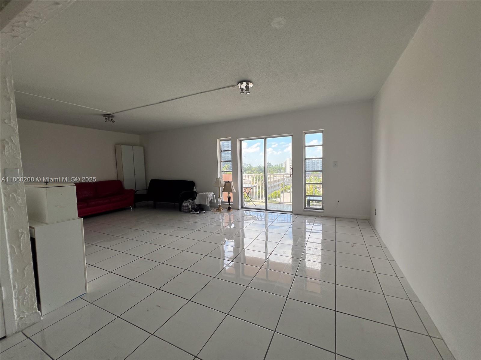 2200 East Hallandale Beach Boulevard, Unit 603 Hallandale Beach, FL 33009 - Photo 3 of 17 a view of livingroom with furniture