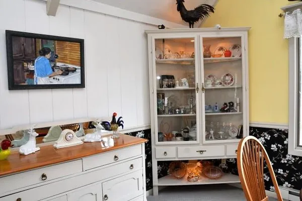 a bedroom with a bed and cabinets